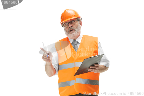 Image of The builder in orange helmet isolated on white