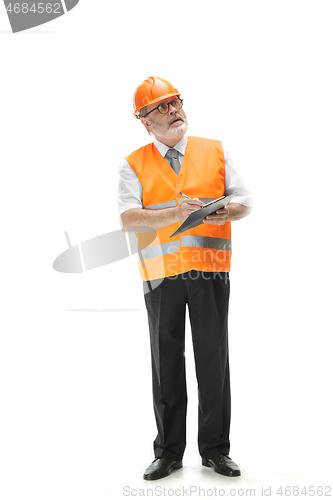 Image of The builder in orange helmet isolated on white