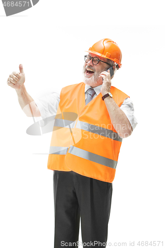 Image of The builder in orange helmet isolated on white