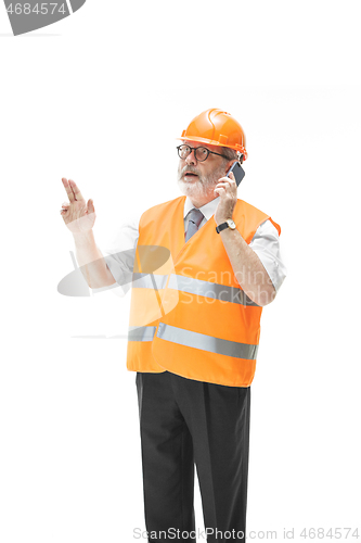 Image of The builder in orange helmet isolated on white