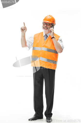 Image of The builder in orange helmet isolated on white