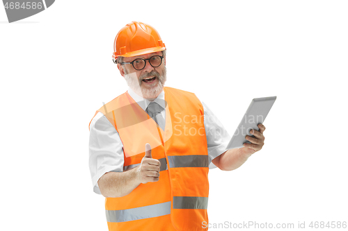 Image of The builder in orange helmet isolated on white