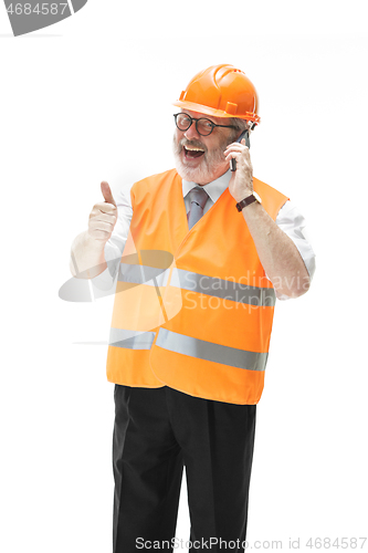 Image of The builder in orange helmet isolated on white