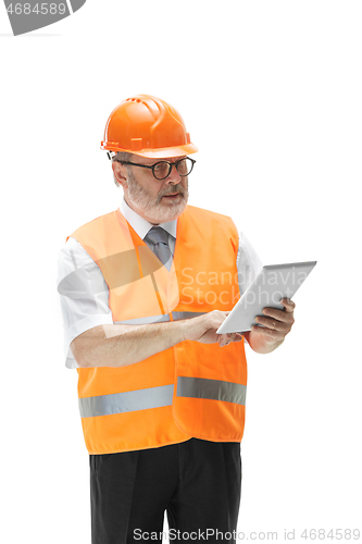 Image of The builder in orange helmet isolated on white