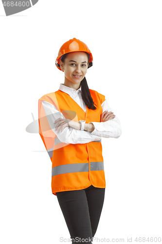 Image of The female builder in orange helmet isolated on white