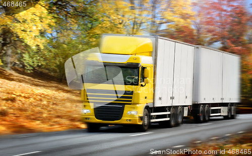 Image of truck driving on country-road/motion