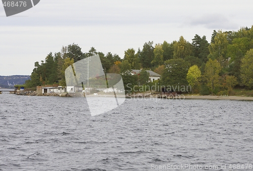 Image of Norwegian house near the sea.