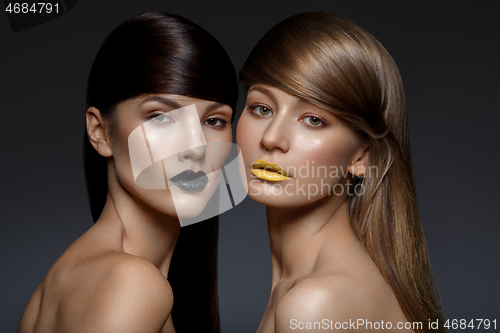 Image of twp beautiful girls with glowing skin