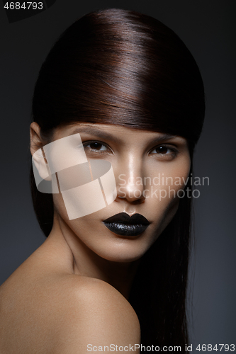 Image of beautiful girl with black lips