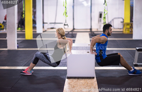 Image of athletes working out their arms