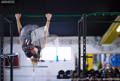 Image of woman doing abs exercises