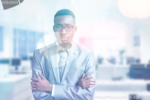 Image of Young businessman in his office