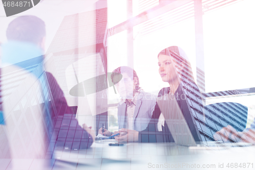 Image of Business Team At A Meeting at modern office building