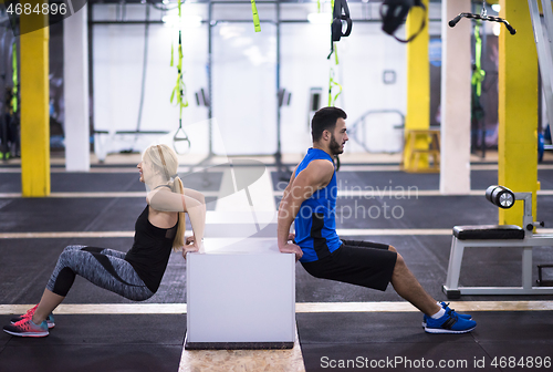 Image of athletes working out their arms