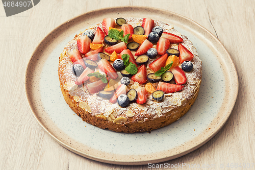 Image of cakes with fruit and berries