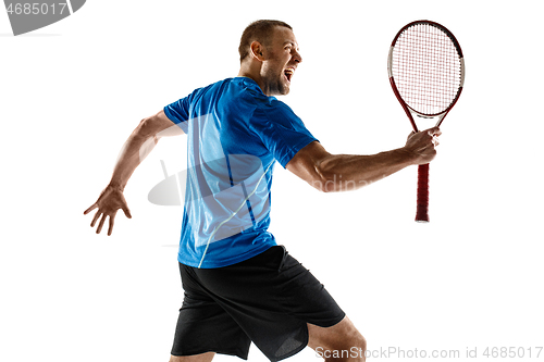 Image of Portrait of a handsome male tennis player celebrating his success isolated on a white background