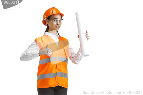 Image of The female builder in orange helmet isolated on white