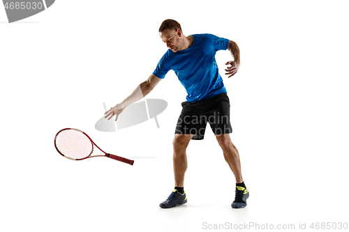 Image of Tennis player crouching down looking defeated and sad