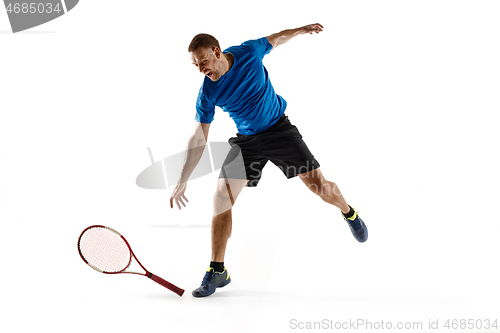 Image of Tennis player crouching down looking defeated and sad