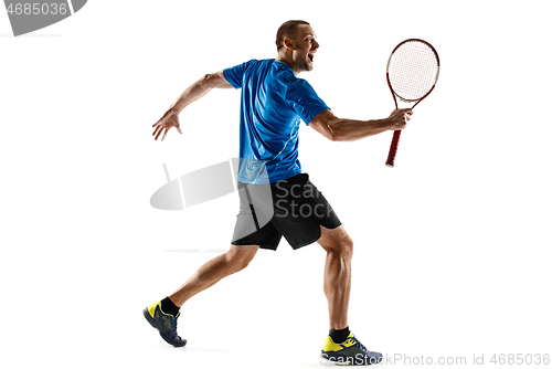 Image of Portrait of a handsome male tennis player celebrating his success isolated on a white background