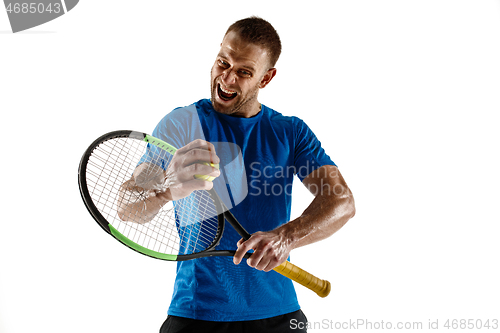 Image of Tennis player crouching down looking defeated and sad