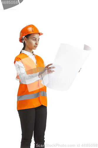 Image of The female builder in orange helmet isolated on white