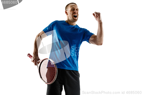 Image of Portrait of a handsome male tennis player celebrating his success isolated on a white background