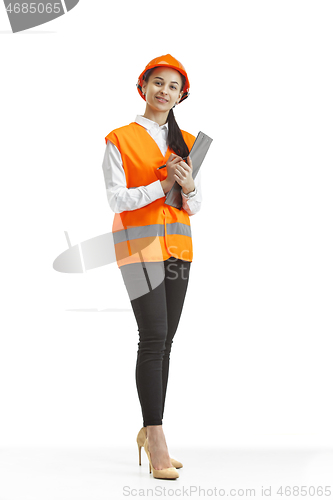 Image of The female builder in orange helmet isolated on white