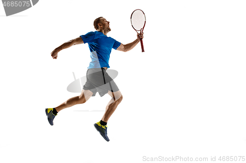 Image of Portrait of a handsome male tennis player celebrating his success isolated on a white background