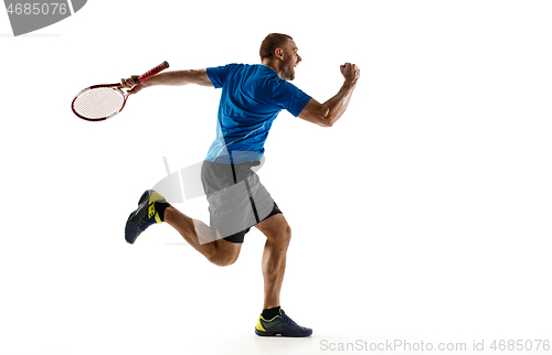 Image of Portrait of a handsome male tennis player celebrating his success isolated on a white background