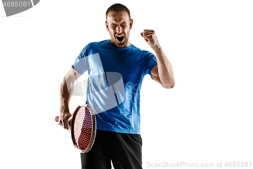 Image of Portrait of a handsome male tennis player celebrating his success isolated on a white background