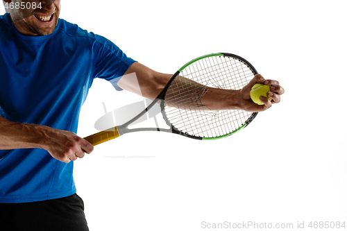 Image of Tennis player crouching down looking defeated and sad