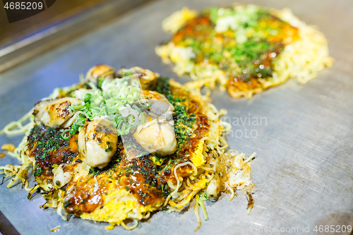 Image of Okonomiyaki Japanese hot plate pizza