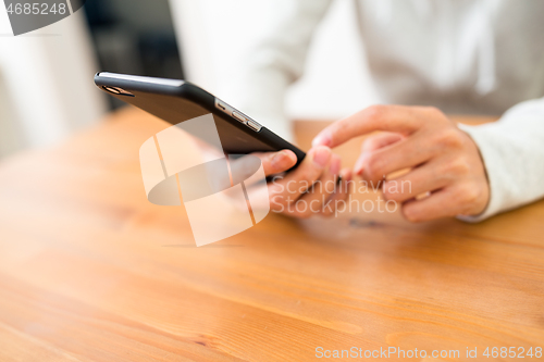 Image of Woman use of mobile phone