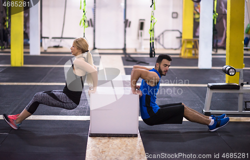 Image of athletes working out their arms