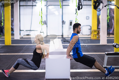 Image of athletes working out their arms