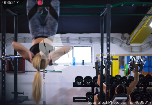 Image of woman doing abs exercises