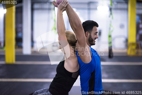 Image of athletes working out their arms