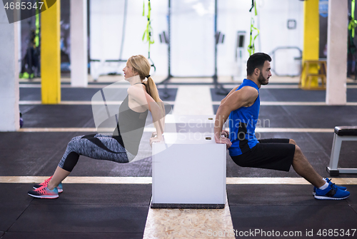 Image of athletes working out their arms