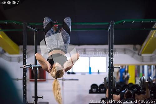 Image of woman doing abs exercises