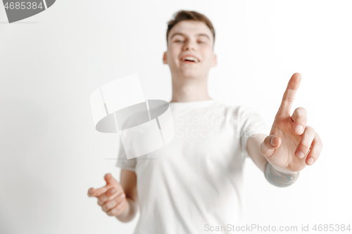 Image of Businessman hand touching empty virtual screen