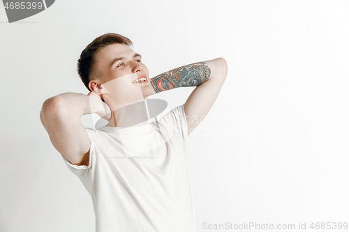 Image of Young dreaming teenager isolated on white background looking at something