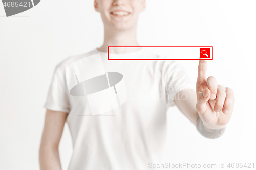 Image of Businessman hand touching empty virtual screen