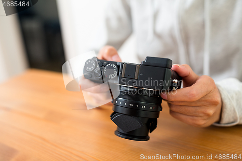 Image of Woman using digital camera