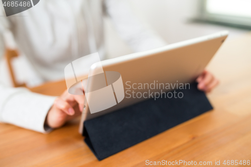 Image of Woman use of tablet computer