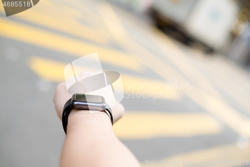 Image of Man with smart watch