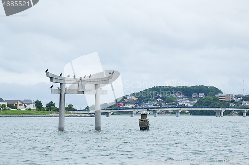 Image of Stone torii with water in Fukuoka city