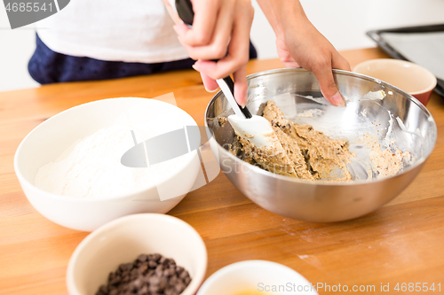 Image of Mixing the dough for making cookies at home