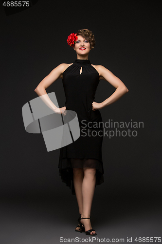 Image of girl dancer in tango dress