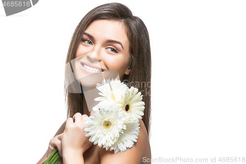 Image of beautiful girl with white flowers